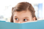 girl reading, hiding